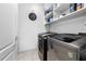 Laundry room with modern appliances, ample storage, and convenient functionality at 3280 Stillhouse Se Ln # 410, Atlanta, GA 30339