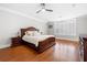 Main bedroom with hardwood floors, neutral paint, and large windows for natural light at 3280 Stillhouse Se Ln # 410, Atlanta, GA 30339