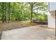Spacious backyard with a concrete patio and a wooden deck, perfect for outdoor entertaining and relaxation at 4510 Virginia Nw Ave, Kennesaw, GA 30144