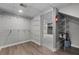 Finished basement features new carpet and leads to utility room at 4510 Virginia Nw Ave, Kennesaw, GA 30144