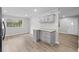 Bright dining area with modern flooring and view to backyard at 4510 Virginia Nw Ave, Kennesaw, GA 30144