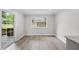 Dining area leading to deck with view of the backyard at 4510 Virginia Nw Ave, Kennesaw, GA 30144