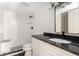 Renovated bathroom with stylish vanity, modern fixtures, and walk-in shower at 26 Ivy Ne Pkwy, Atlanta, GA 30342