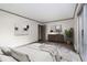 Bedroom with plank floors, a small dresser, and a sliding glass door to the outdoors at 26 Ivy Ne Pkwy, Atlanta, GA 30342