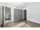 Bedroom with hardwood floors, closet and ensuite bathroom at 26 Ivy Ne Pkwy, Atlanta, GA 30342