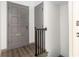Entryway with updated wood floors, gray-toned walls, and contrasting trim that leads into a bright interior space at 26 Ivy Ne Pkwy, Atlanta, GA 30342