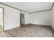Empty living room with hardwood floors and neutral walls at 26 Ivy Ne Pkwy, Atlanta, GA 30342