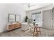Cozy office space with neutral tones, hardwood floors and a ceiling fan at 26 Ivy Ne Pkwy, Atlanta, GA 30342