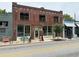 Charming Halfway Crooks brewery, displaying its brick facade and inviting street presence at 380 Grant Se Cir # 110, Atlanta, GA 30315