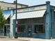 Quaint Little Tart bakery cafe, featuring blue painted brick and a welcoming storefront at 380 Grant Se Cir # 110, Atlanta, GA 30315