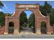 Historic Oakland Cemetery gate, showcasing its brick archway and intricate ironwork at 380 Grant Se Cir # 110, Atlanta, GA 30315