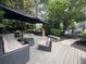 Outdoor lounge area with comfortable seating, grills, and shade perfect for relaxation and socializing at 380 Grant Se Cir # 110, Atlanta, GA 30315