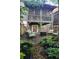 Relaxing patio with outdoor seating, firepit, and beautiful landscaping perfect for entertaining guests at 380 Grant Se Cir # 110, Atlanta, GA 30315