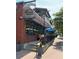 Six Feet Under Pub & Fish House exterior with brick facade, outdoor seating, and charming details at 380 Grant Se Cir # 110, Atlanta, GA 30315