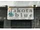Dakota Blue neighborhood restaurant sign featuring modern typography and branding at 380 Grant Se Cir # 110, Atlanta, GA 30315