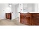 Bathroom featuring double sinks and a tile floor at 4945 Racquet Ct, Duluth, GA 30096