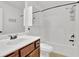 Bathroom with single vanity, shower and tub combination, and tile floors at 4945 Racquet Ct, Duluth, GA 30096