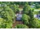 Nestled among trees, a charming home offers privacy and a connection to nature at 1377 Hill Sw Dr, Conyers, GA 30094