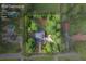 Lot overview showing property lines, the home, pool, and surrounding greenery in Conyers, GA at 1377 Hill Sw Dr, Conyers, GA 30094