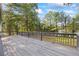 A spacious wooden back deck perfect for outdoor entertaining and relaxing at 1377 Hill Sw Dr, Conyers, GA 30094