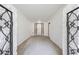 Charming entrance showcasing decorative iron gates and a view of the front door at 1377 Hill Sw Dr, Conyers, GA 30094