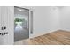 Bright living room featuring wood-look floors, and white walls providing a light and airy ambiance at 1377 Hill Sw Dr, Conyers, GA 30094