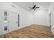 Spacious room featuring wood-look floors, a vaulted ceiling, a modern ceiling fan and recessed lighting at 1377 Hill Sw Dr, Conyers, GA 30094