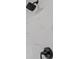 Close-up of shower featuring a shower head with dark hardware and tiled surround at 1377 Hill Sw Dr, Conyers, GA 30094