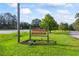 Golden Acres subdivision sign with lush green lawn along the road at 1377 Hill Sw Dr, Conyers, GA 30094