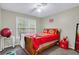 This charming bedroom is decorated with sports-themed decor at 1574 Glenfield Dr, Lawrenceville, GA 30043
