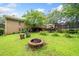 Inviting backyard featuring a fire pit, deck, and recreational space at 2095 Gherry Dr, Austell, GA 30106