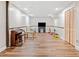 Spacious finished basement with wood-look floors, recessed lighting, piano, TV and ample room to play at 2095 Gherry Dr, Austell, GA 30106