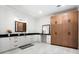 Functional dressing room equipped with a vanity, ample counter space, and floor to ceiling cabinet storage at 330 Longvue Ct, Johns Creek, GA 30097