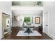 Expansive foyer featuring dark hardwood floors and an open view to other areas of the home at 330 Longvue Ct, Johns Creek, GA 30097