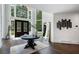 Elegant foyer boasting soaring ceilings, dark hardwood floors, and a large mirror at 330 Longvue Ct, Johns Creek, GA 30097