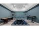 Game room with a ping pong table, a shuffleboard table, and lighting at 330 Longvue Ct, Johns Creek, GA 30097