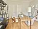 View of office featuring hardwood flooring, desk, and ample natural light at 445 Sweet Ivy Ln, Lawrenceville, GA 30043