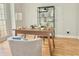 Office with hardwood flooring and a desk by the window at 445 Sweet Ivy Ln, Lawrenceville, GA 30043