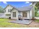 Backyard featuring a porch, patio, and green lawn at 6402 Grafton Ct, Austell, GA 30168