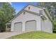 This charming home boasts a spacious two-car garage and impeccable siding and landscaping at 6402 Grafton Ct, Austell, GA 30168
