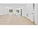 Bright and airy living room with modern flooring, offering a clean and inviting space for relaxation at 6402 Grafton Ct, Austell, GA 30168