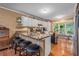 This kitchen has granite counters, stainless appliances and a breakfast bar at 1526 Oakleaf Dr, Auburn, GA 30011