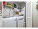 Laundry area featuring modern washer and dryer, as well as ample storage at 1526 Oakleaf Dr, Auburn, GA 30011