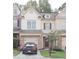 Charming townhome with a well-manicured lawn and inviting curb appeal at 3130 Haynes Park Dr, Lithonia, GA 30038