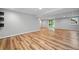 Basement with vinyl plank flooring, sliding glass doors to backyard, and recessed lighting at 2578 Morgan Lake Ne Dr, Marietta, GA 30066