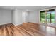 Finished basement with vinyl plank flooring and sliding glass doors to the backyard and pool at 2578 Morgan Lake Ne Dr, Marietta, GA 30066