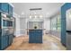 Stylish kitchen with central island, stainless steel appliances, and tiled flooring at 2578 Morgan Lake Ne Dr, Marietta, GA 30066