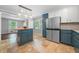 Modern kitchen featuring an island, stainless steel appliances, and bright lighting at 2578 Morgan Lake Ne Dr, Marietta, GA 30066