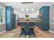 Well-lit kitchen with stainless appliances, ample counter space, and a central island with barstools and pendant lighting at 2578 Morgan Lake Ne Dr, Marietta, GA 30066