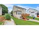 Backyard view featuring a wooden deck and a well-maintained lawn at 266 Monarch Village Way, Stockbridge, GA 30281